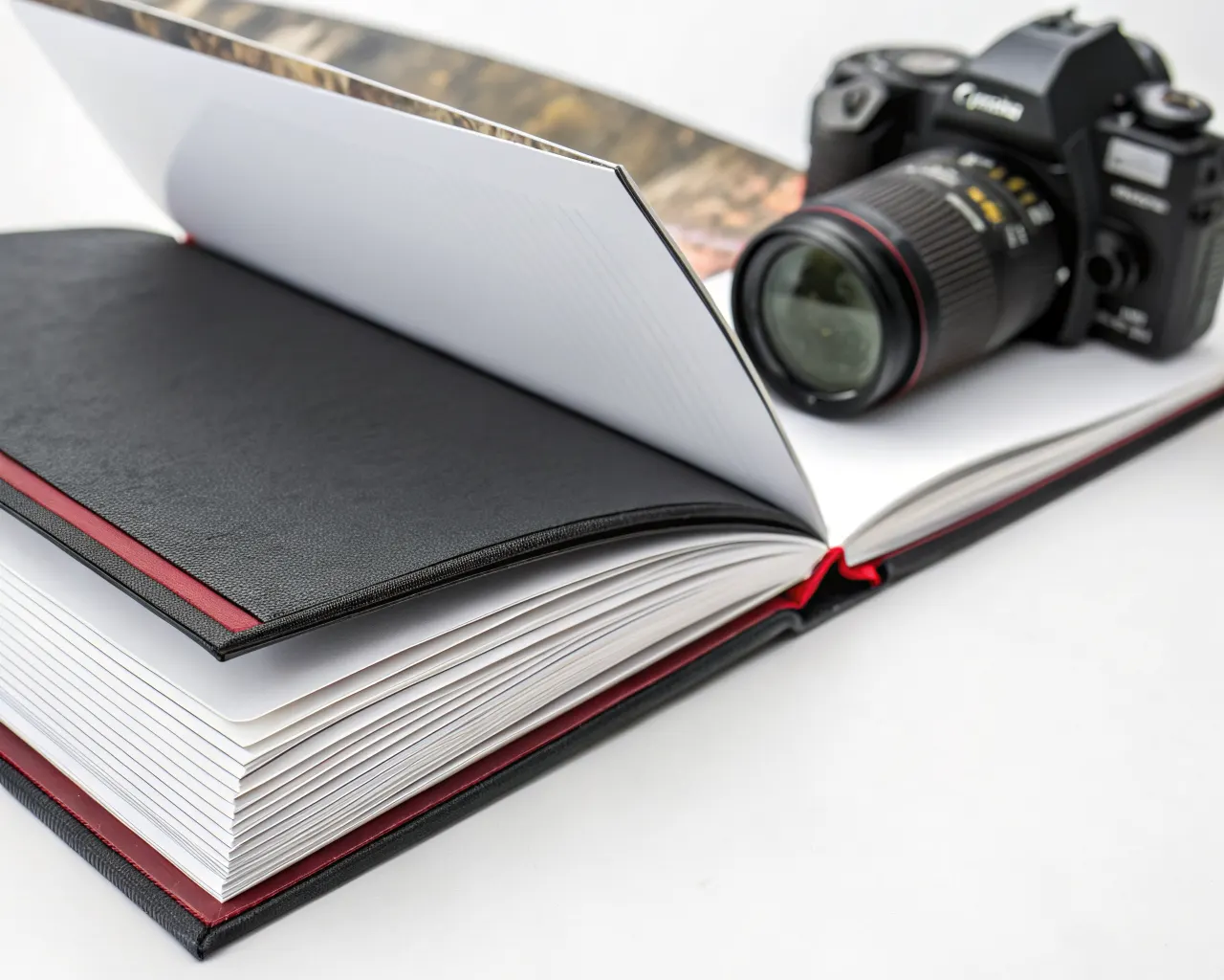 Perfect bound booklet open on a white surface showing thick glued spine and sturdy book-like finish for catalogs and magazines
